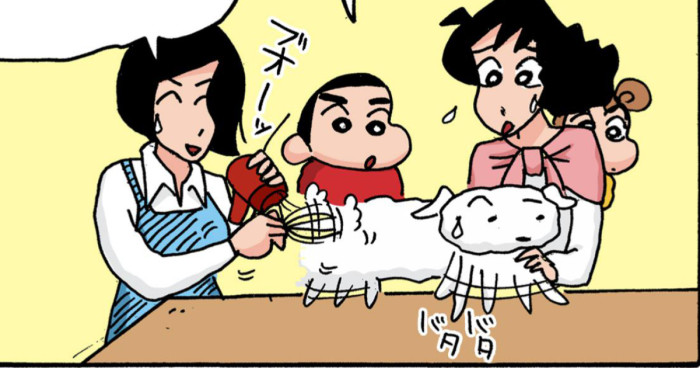 暴れるシロを抑えるみさえ