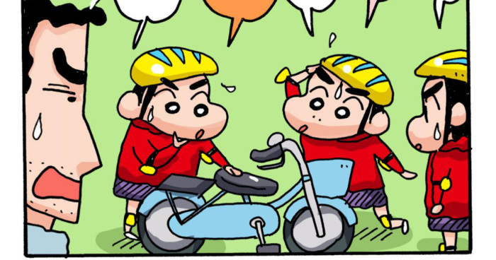 自転車の点検をするしんちゃん