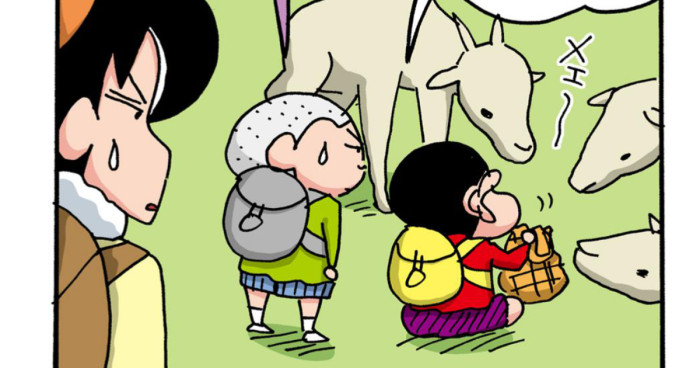 ヤギに餌を配るしんちゃん